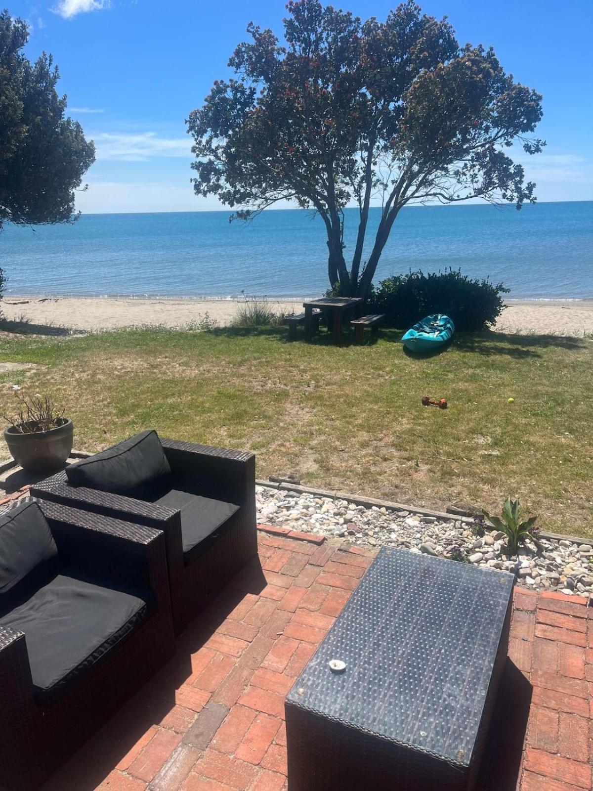 Beachfront Bliss - Your Parapara Seaside Retreat Exterior photo